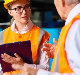plant workers discussing