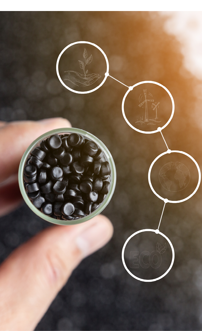 Hand holding glass bulb plastic beads. recycle icon. Save environment concept. black polymer pallet.